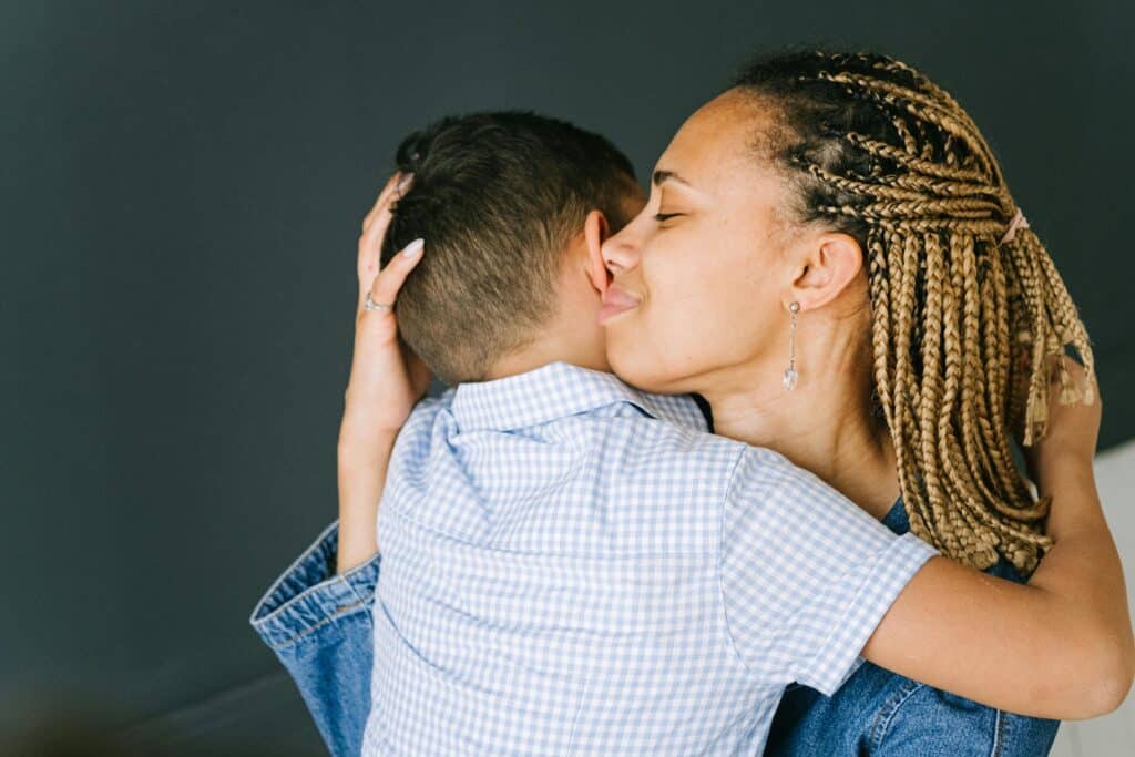 Social Worker Hugging a Child
