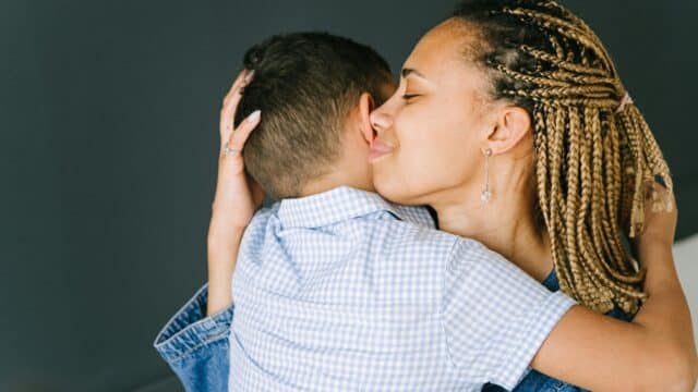 Social Worker Hugging a Child