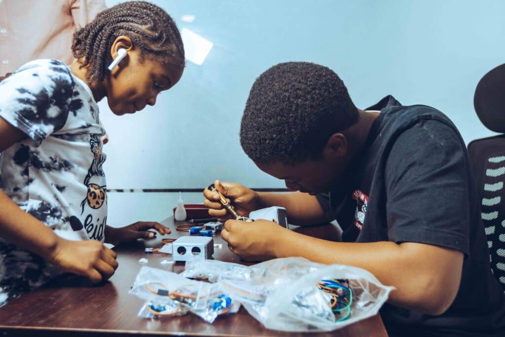Why South African school leaders aren’t prepared for 21st-century learning Two students engaged in hands-on electronics learning in a classroom setting in Accra, Ghana.